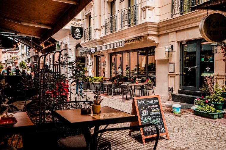 A cozy café terrace with warm seating