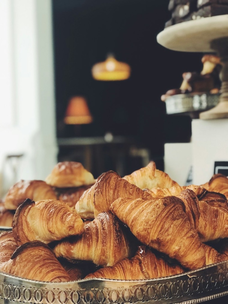 A tray of golden French croissants